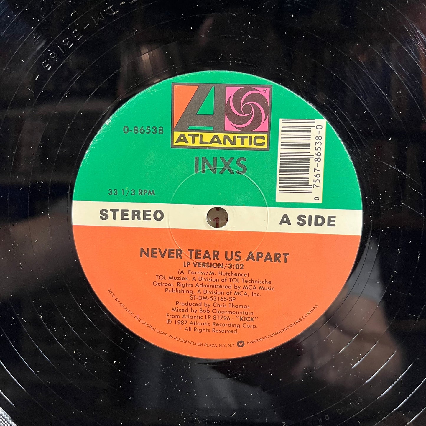 Never Tear Us Apart (VINYL) | Very Good Plus (VG+) Near Mint (NM)