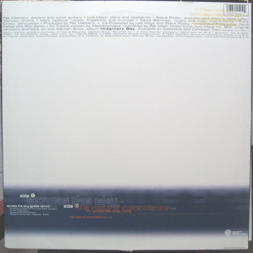 Across The Sky / The Roots Of Coincidence (GOLDIE) | Excellent+ (EX+) Excellent (EX)