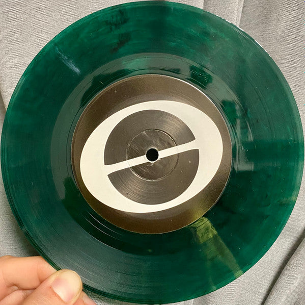 At Capacity (TRANSPARENT GREEN MARBLE VINYL 7") | Mint (M) Mint (M)