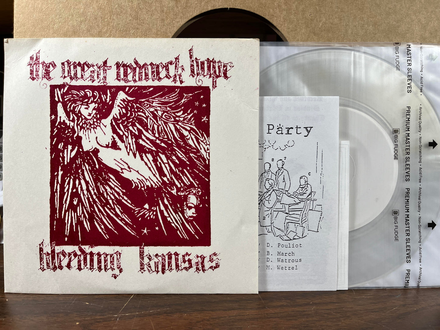 Split 7" (CLEAR 7" VINYL) | Near Mint (NM or M-) Excellent+ (EX+)